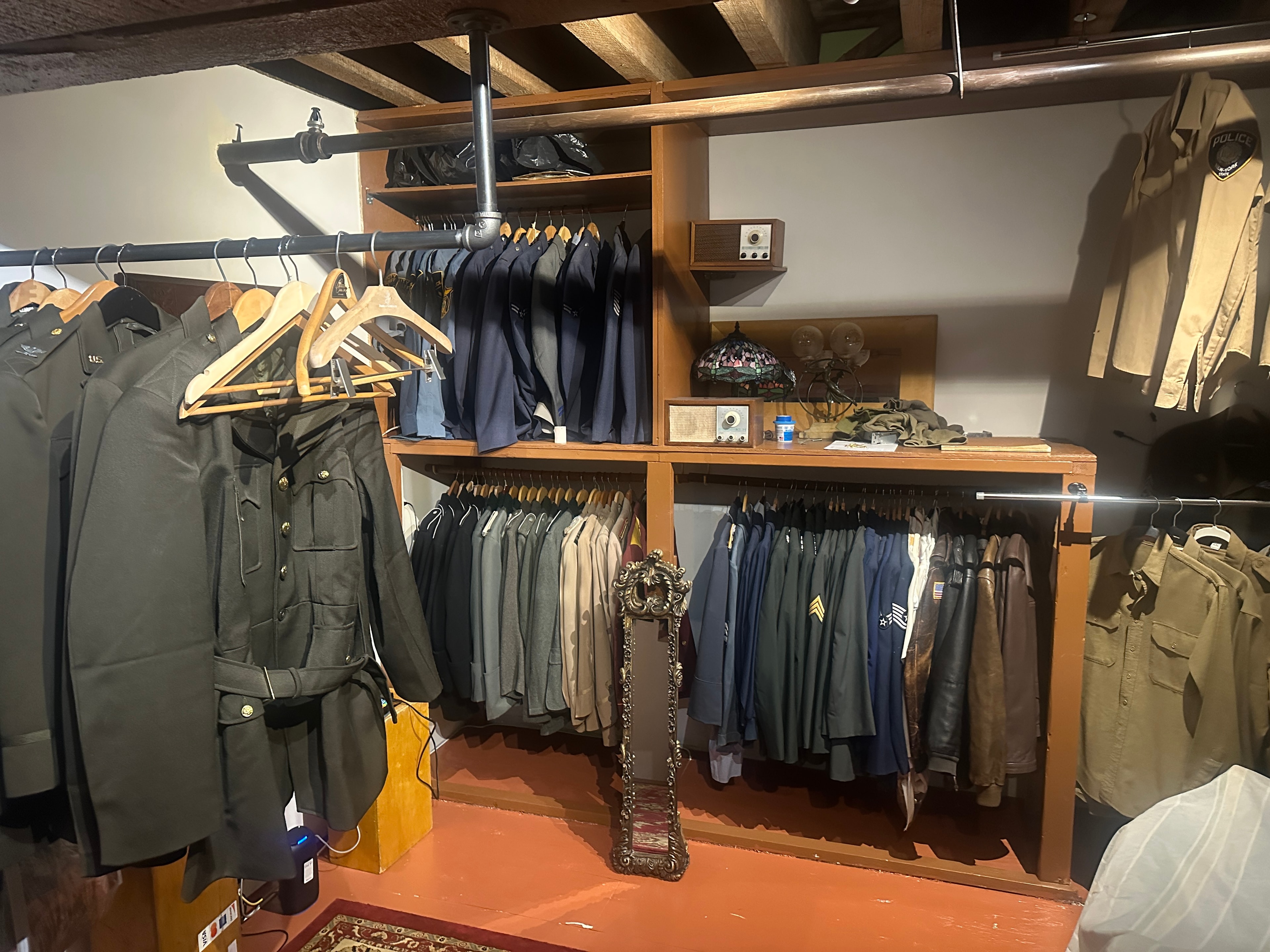 Costume wardrobe room with military and period uniforms