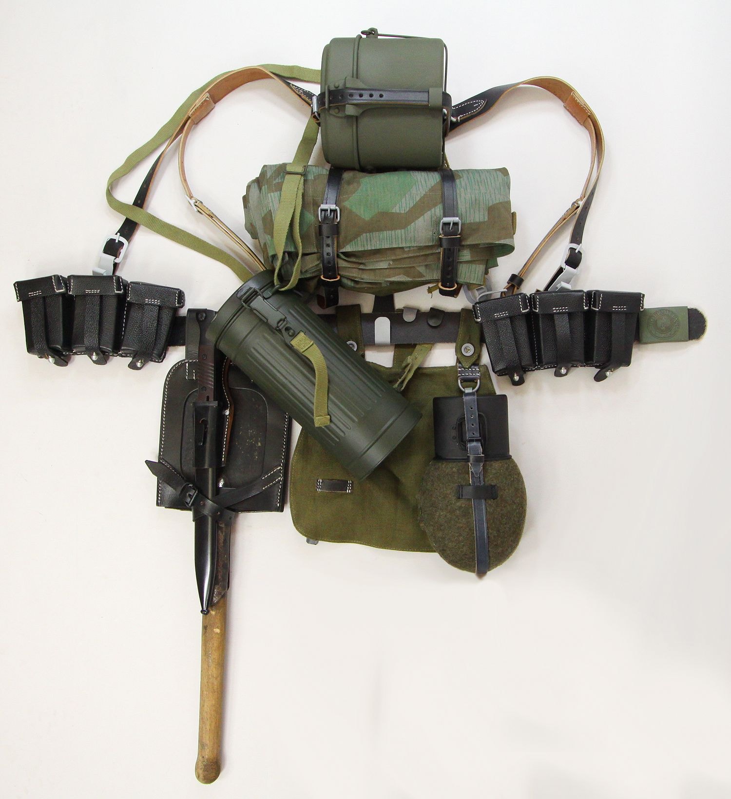 German WWII combat pack gear with backpack, canteen, shovel, ammo pouches and belt