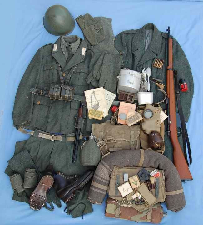 WWII Italian full gear uniform helmet rifle gas mask and accessories flat lay